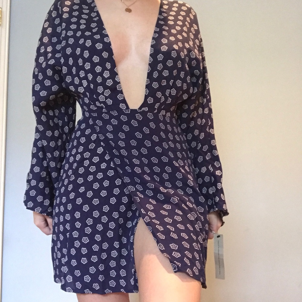 Low v Reformation dress with front slit